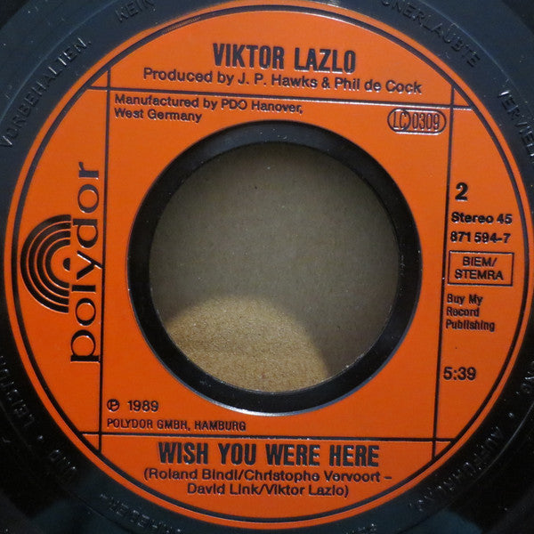 Viktor Lazlo : City Never Sleeps (7", Single)