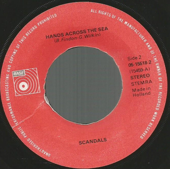 Scandals : Make Me Believe / Hands Across The Sea (7", Single)