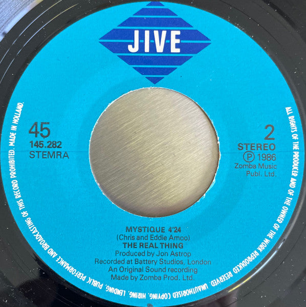 The Real Thing : Straight To The Heart (7", Single)
