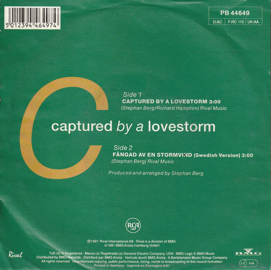 Carola (3) : Captured By A Lovestorm (7", Single)