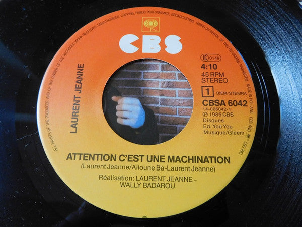 Laurent Jeanne : Attention C'Est Une Machination Remix (7")