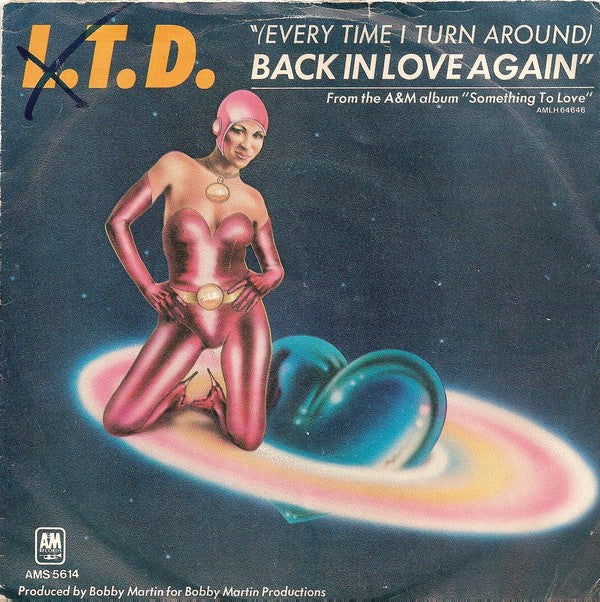 L.T.D. : (Every Time I Turn Around) Back In Love Again (7", Single)