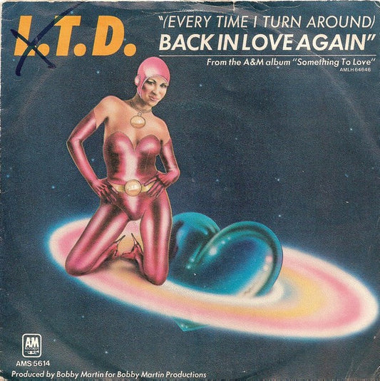 L.T.D. : (Every Time I Turn Around) Back In Love Again (7", Single)