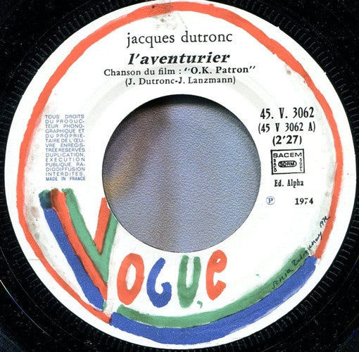 Jacques Dutronc : L'Aventurier (Chanson Du Film "O.K. Patron") / L'Amour À La Chaine (7", Single)