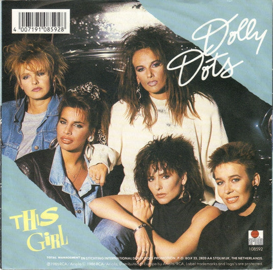 Dolly Dots : This Girl (7", Single)