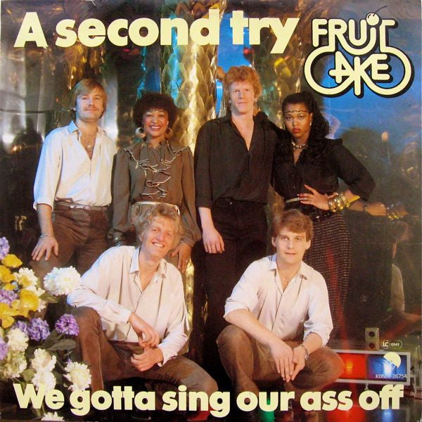 Fruitcake : A Second Try / We Gotta Sing Our Ass Off (12", Single)