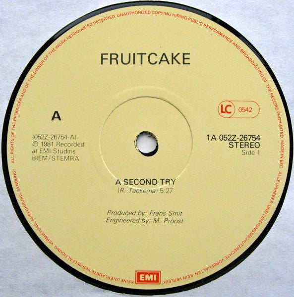 Fruitcake : A Second Try / We Gotta Sing Our Ass Off (12", Single)