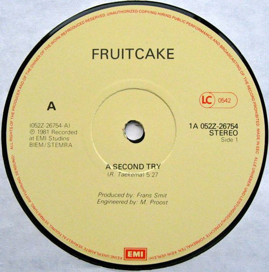 Fruitcake : A Second Try / We Gotta Sing Our Ass Off (12", Single)