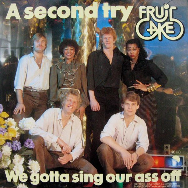Fruitcake : A Second Try / We Gotta Sing Our Ass Off (12", Single)