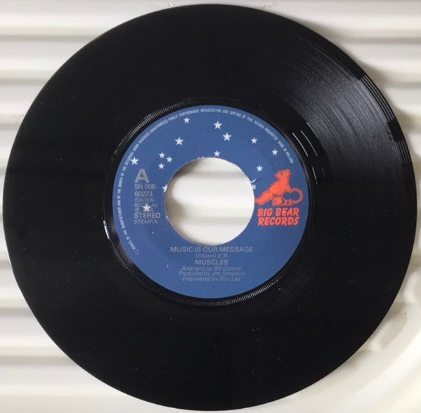 Muscles (2) : Music Is Our Message (7")