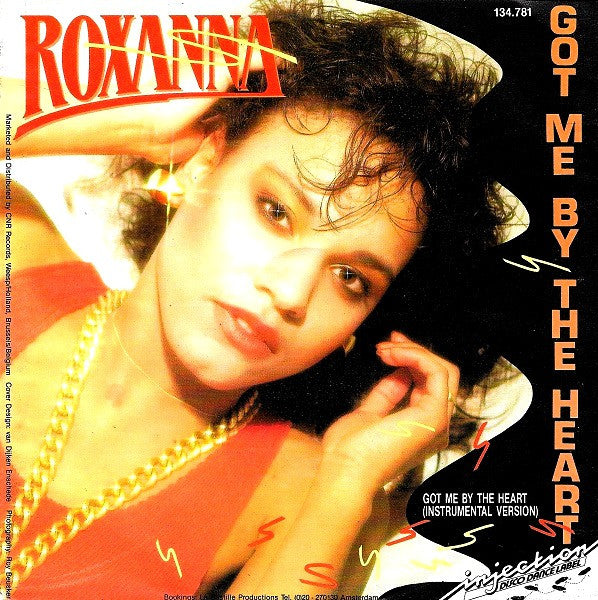 Roxanna : Got Me By The Heart (7", Single)