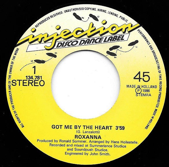 Roxanna : Got Me By The Heart (7", Single)