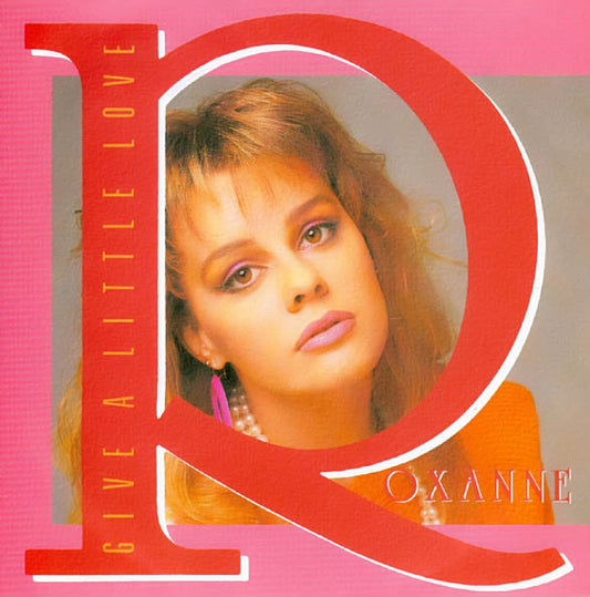 Roxanne (2) : Give A Little Love (7", Single)