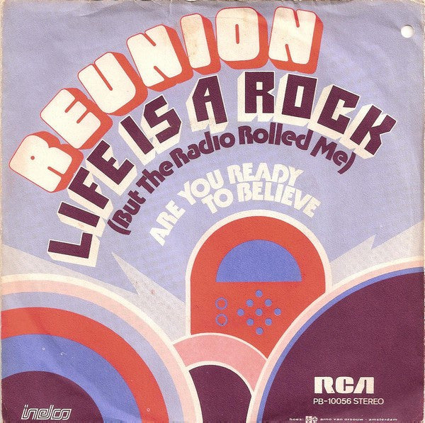 Reunion (3) : Life Is A Rock (But The Radio Rolled Me) (7", Single)