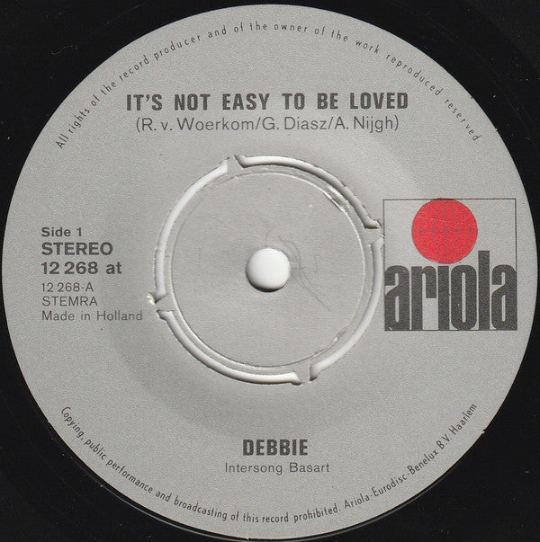 Debbie (6) : It's Not Easy To Be Loved (7", Single)