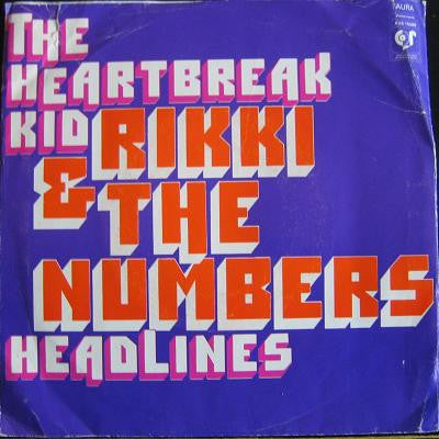 Rikki & The Numbers : The Heartbreak Kid (7", Single)