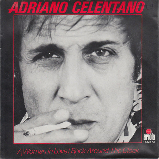Adriano Celentano : A Woman In Love - Rock Around The Clock / Preghero (7", Single)