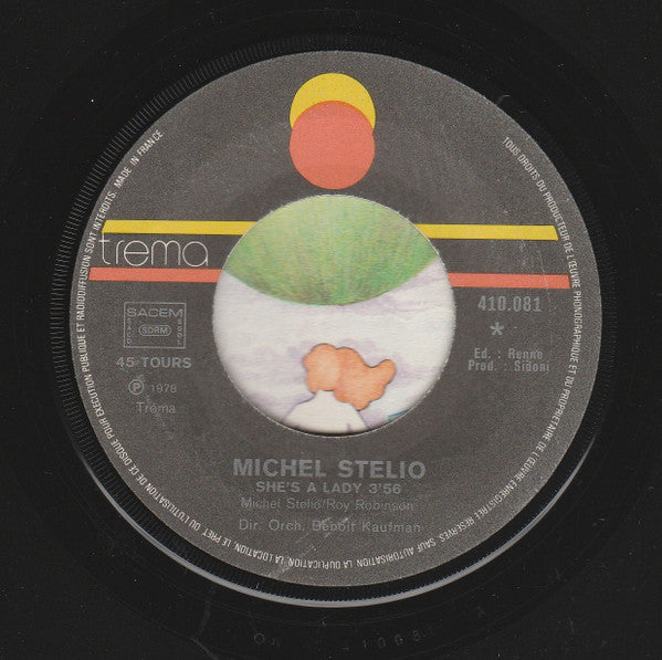 Michel Stelio : She's A Lady (7", Single)