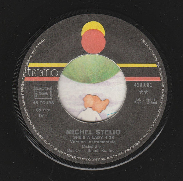 Michel Stelio : She's A Lady (7", Single)