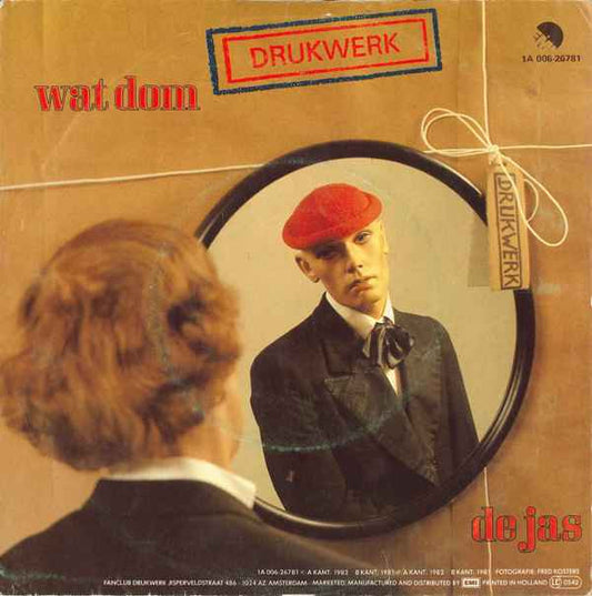 Drukwerk : Wat Dom / De Jas (7", Single)