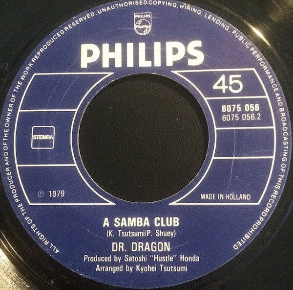 Dr. Dragon & The Oriental Express : Superman, He's A Macho / A Samba Club (7", Single)
