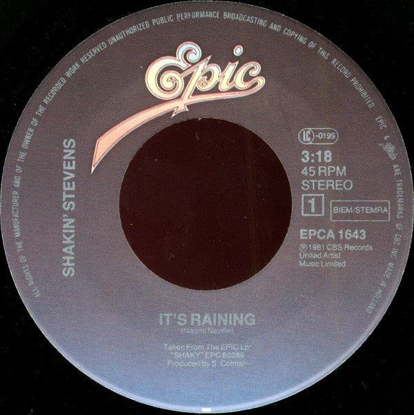 Shakin' Stevens : It's Raining (7", Single)