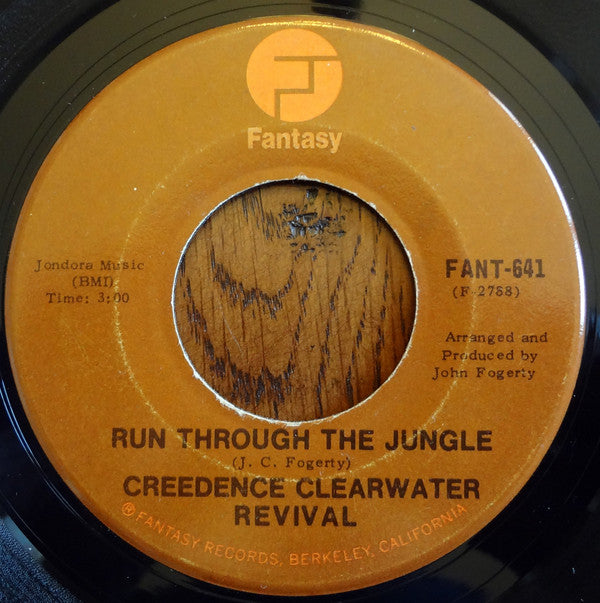 Creedence Clearwater Revival : Run Through The Jungle / Up Around The Bend (7", Single, RE)