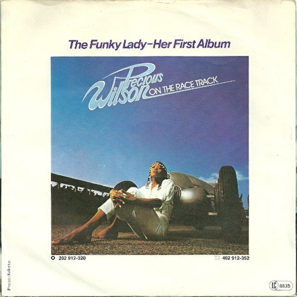 Precious Wilson : We Are On The Race Track / Mr. Pilot Man (7", Single)