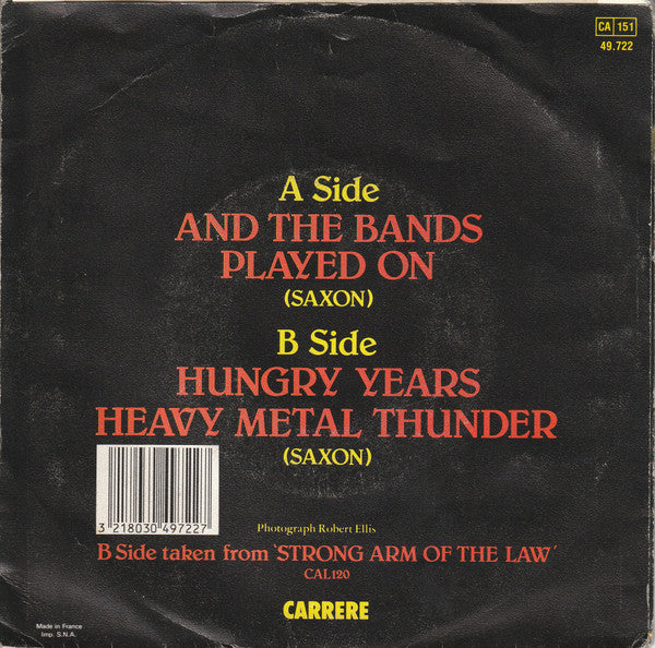 Saxon : And The Bands Played On (7")