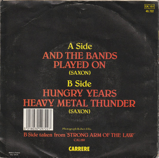 Saxon : And The Bands Played On (7")