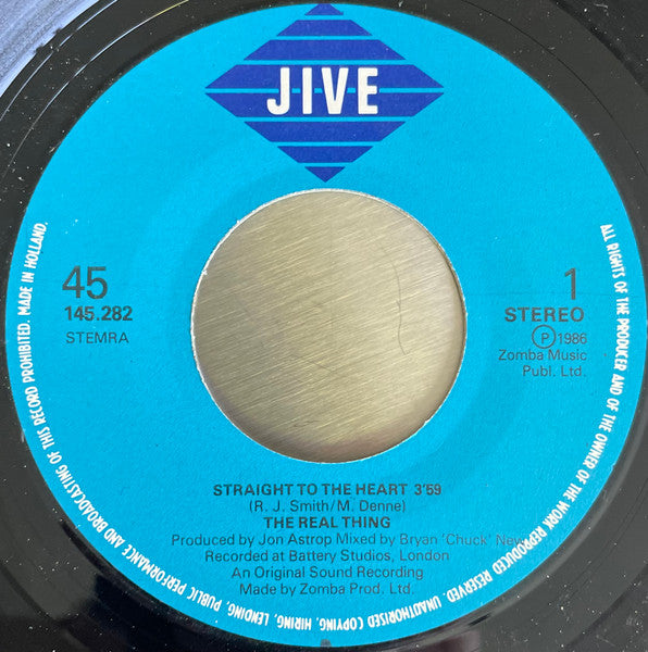 The Real Thing : Straight To The Heart (7", Single)