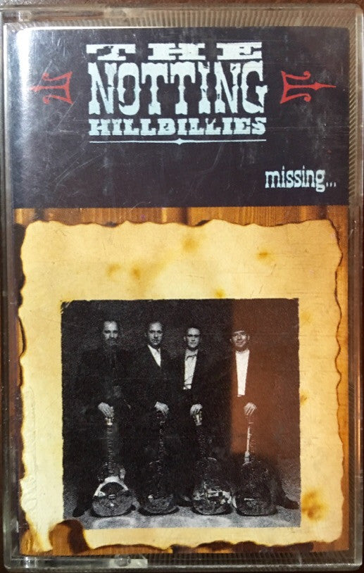 The Notting Hillbillies : Missing... Presumed Having A Good Time (Cass, Album)
