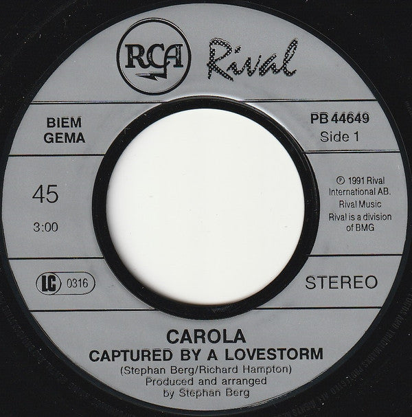 Carola (3) : Captured By A Lovestorm (7", Single)