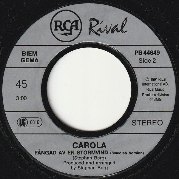 Carola (3) : Captured By A Lovestorm (7", Single)